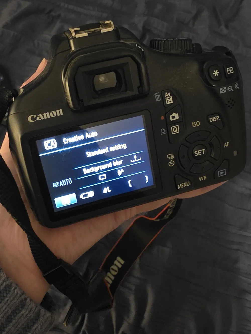 Canon DSLR Camera with Black Body and Black Lens